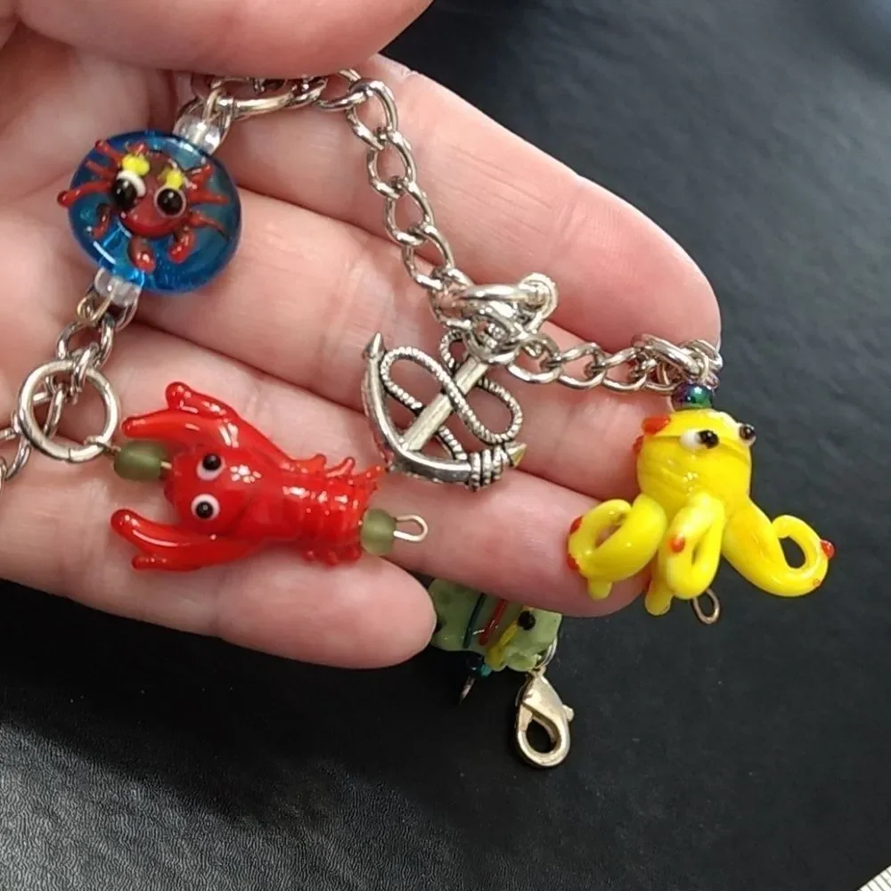 Silver tone Under The Sea charm bracelet up to 9